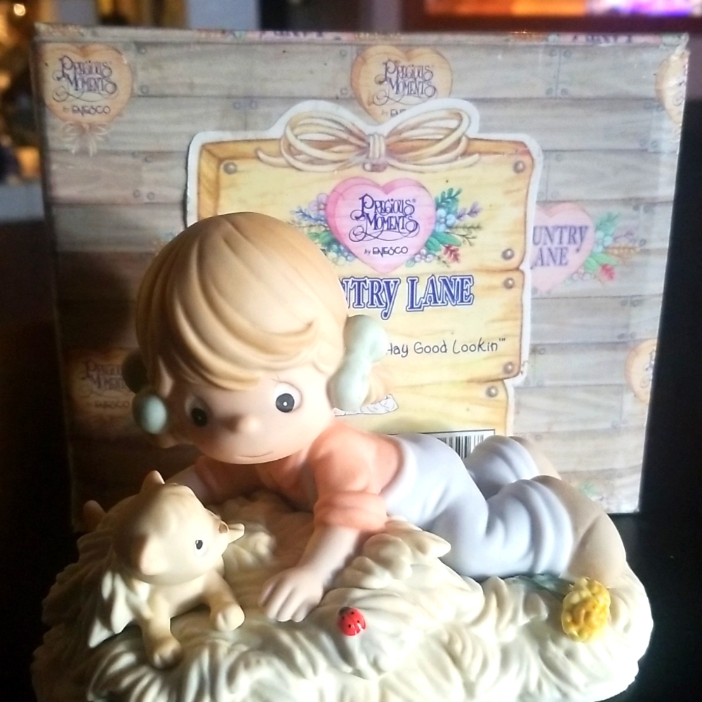 1999 Precious moments retired piece